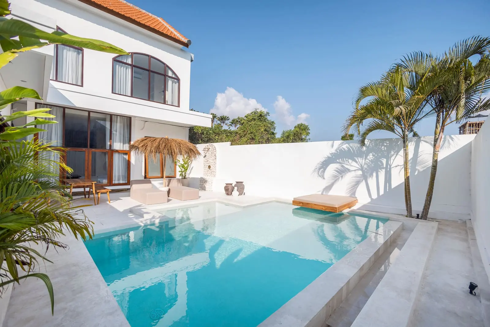 Pool and villa exterior