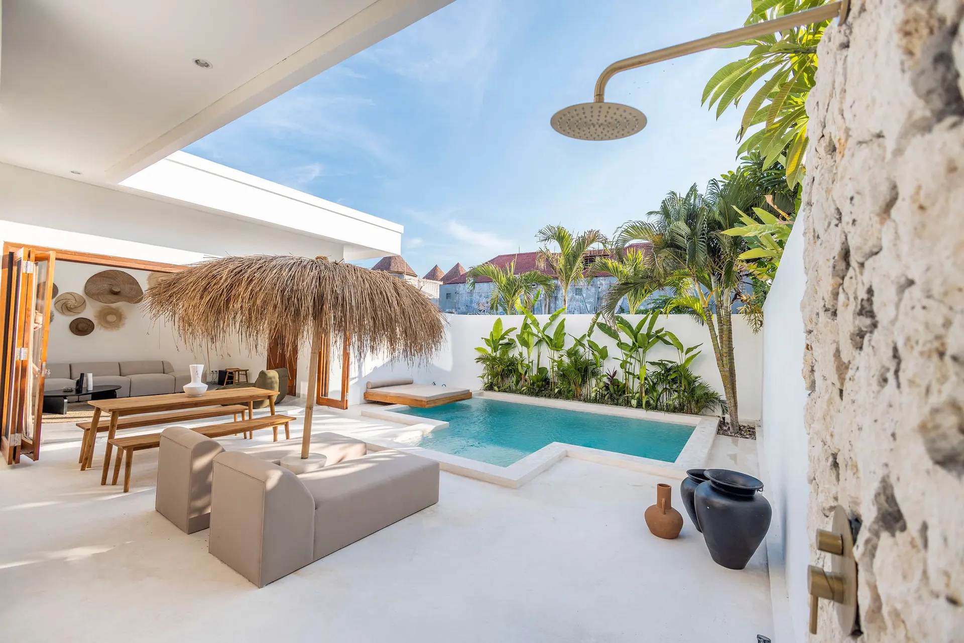 Beach Villas Canggu pool and tropical garden in the morning light